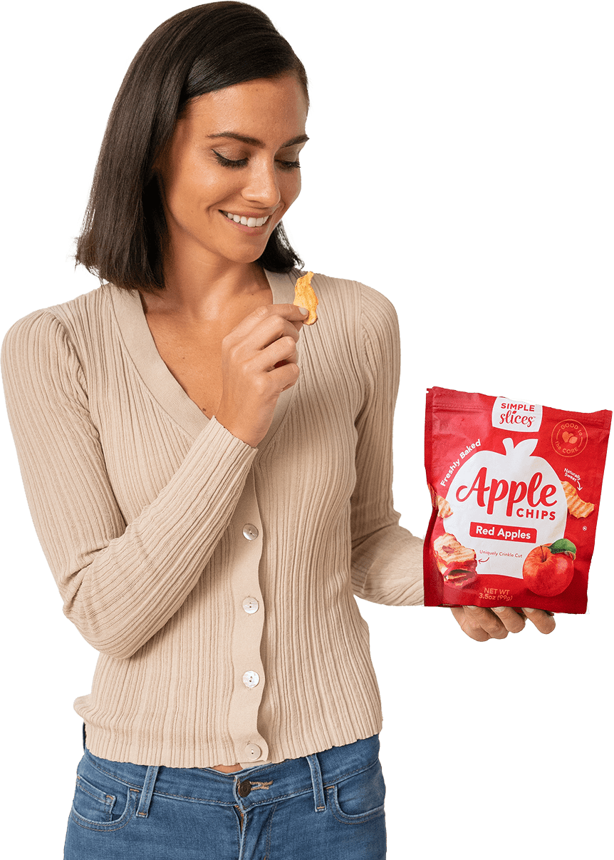 Woman eating Simple Slices Apple Chips
